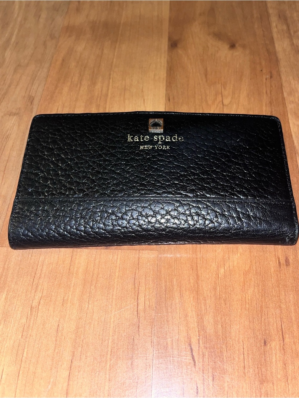 kate spade Black Pebbled Leather Logo Wallet with Gold Accent